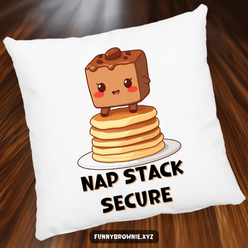 Funny pillow with a brownie character grinning while balancing on a stack of wobbly pancakes, adding a touch of breakfast cheer.